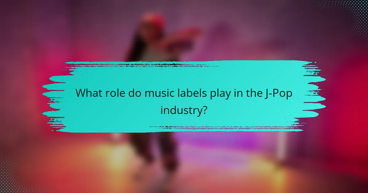 What role do music labels play in the J-Pop industry?